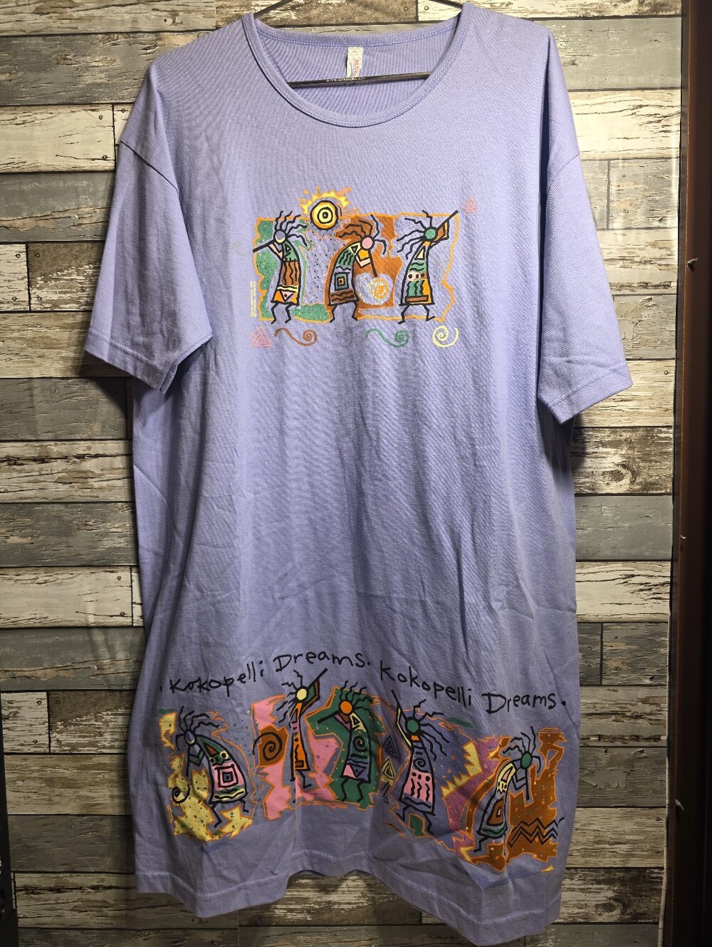 Alstyle Lavender Short Sleeve Tee with Multicolor Kokopelli Graphics